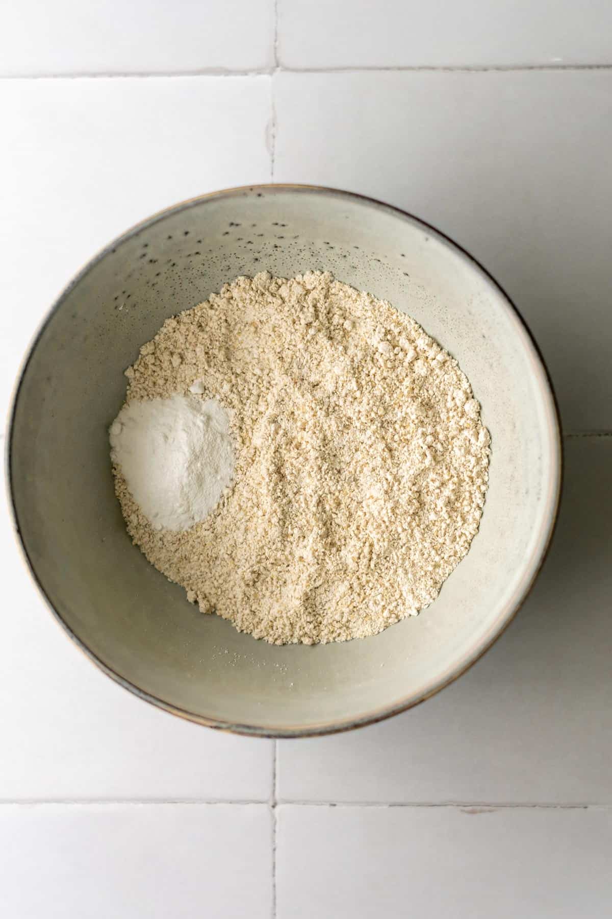 a bowl of oat flour and baking powder