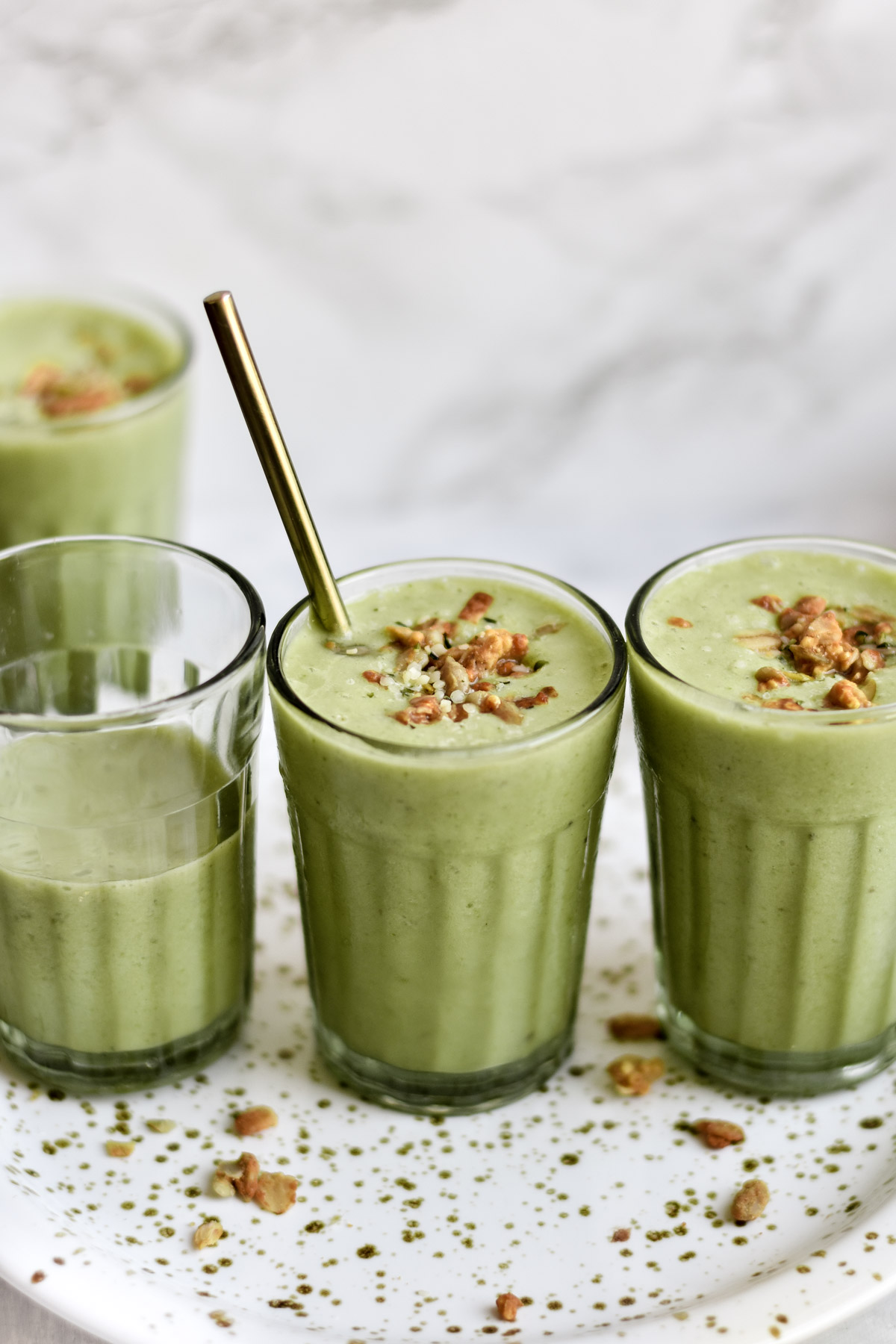 three glasses of green smoothie