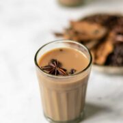 a glass filled with hot masala chai