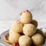 coconut ladoo stacked on top of each other