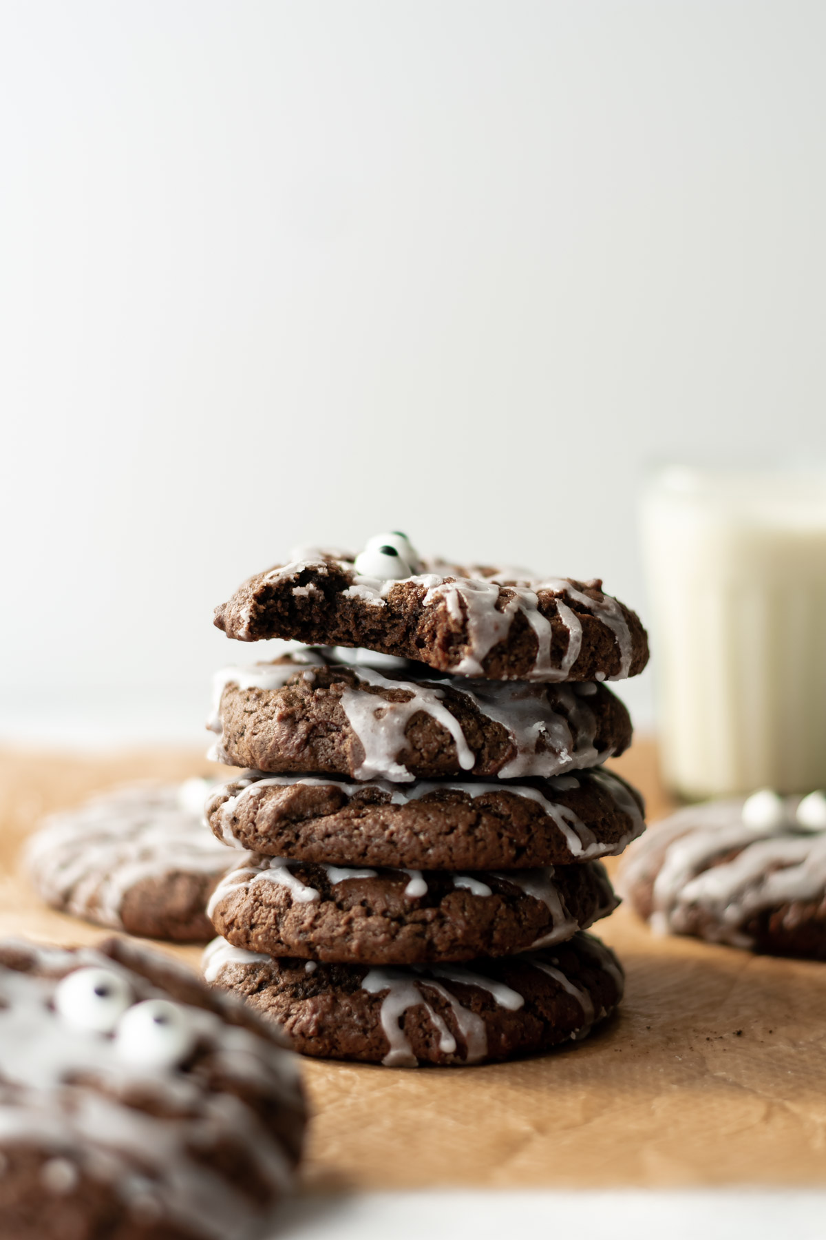 a stack of cookies and a glass of milk