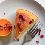 a slice of cake on a plate with a fork