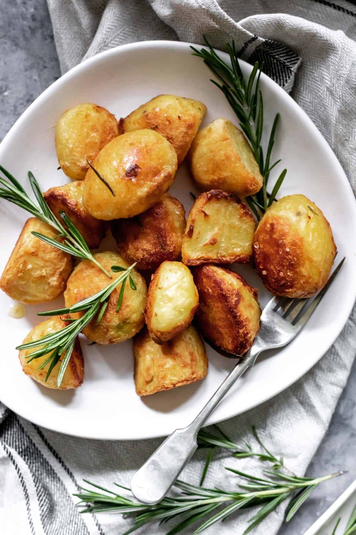 a plate with crispy roasted potatoes on it