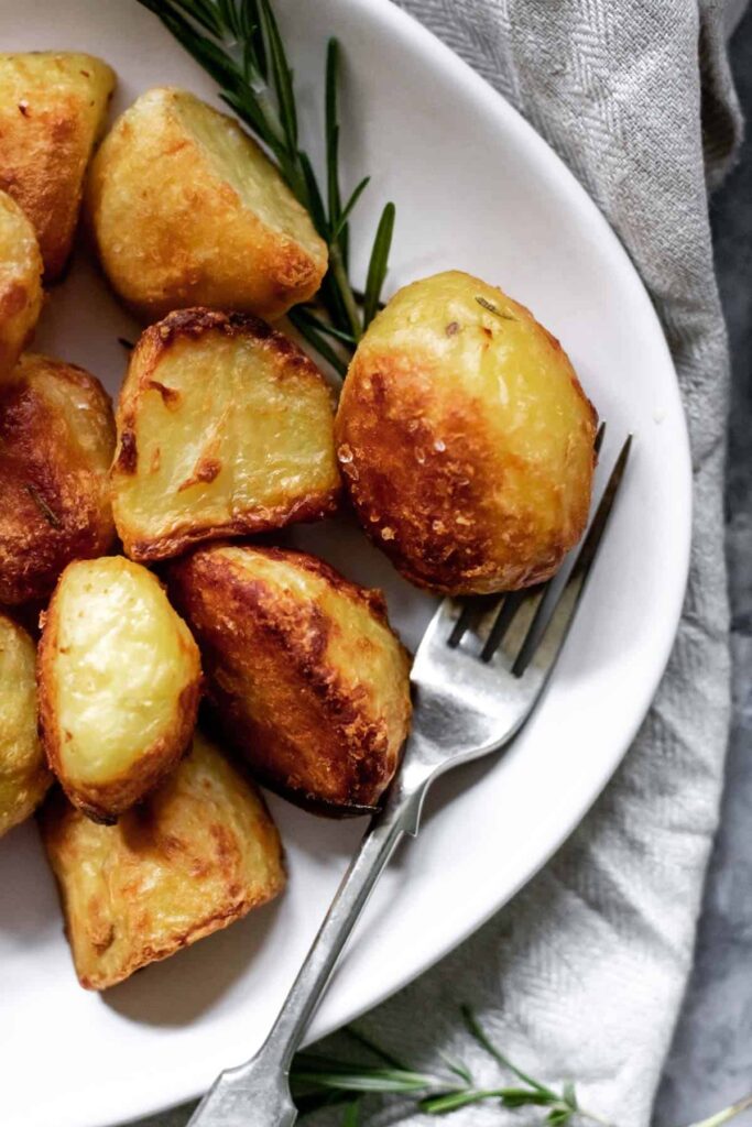 a roast potato on a fork