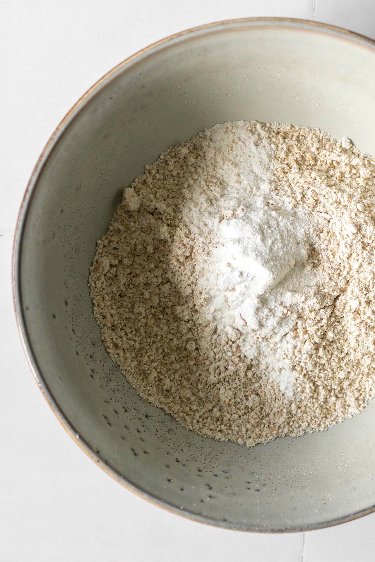 oat flour and baking powder in a bowl