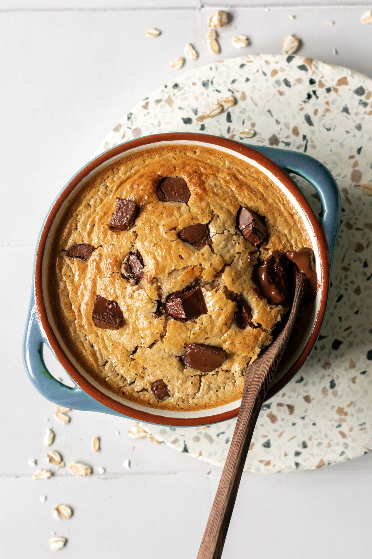 chocolate chip baked oats being dug into with a spoon