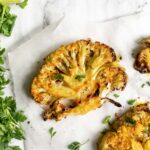 a cauliflower steak roasted with turmeric and spices