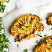 a cauliflower steak roasted with turmeric and spices