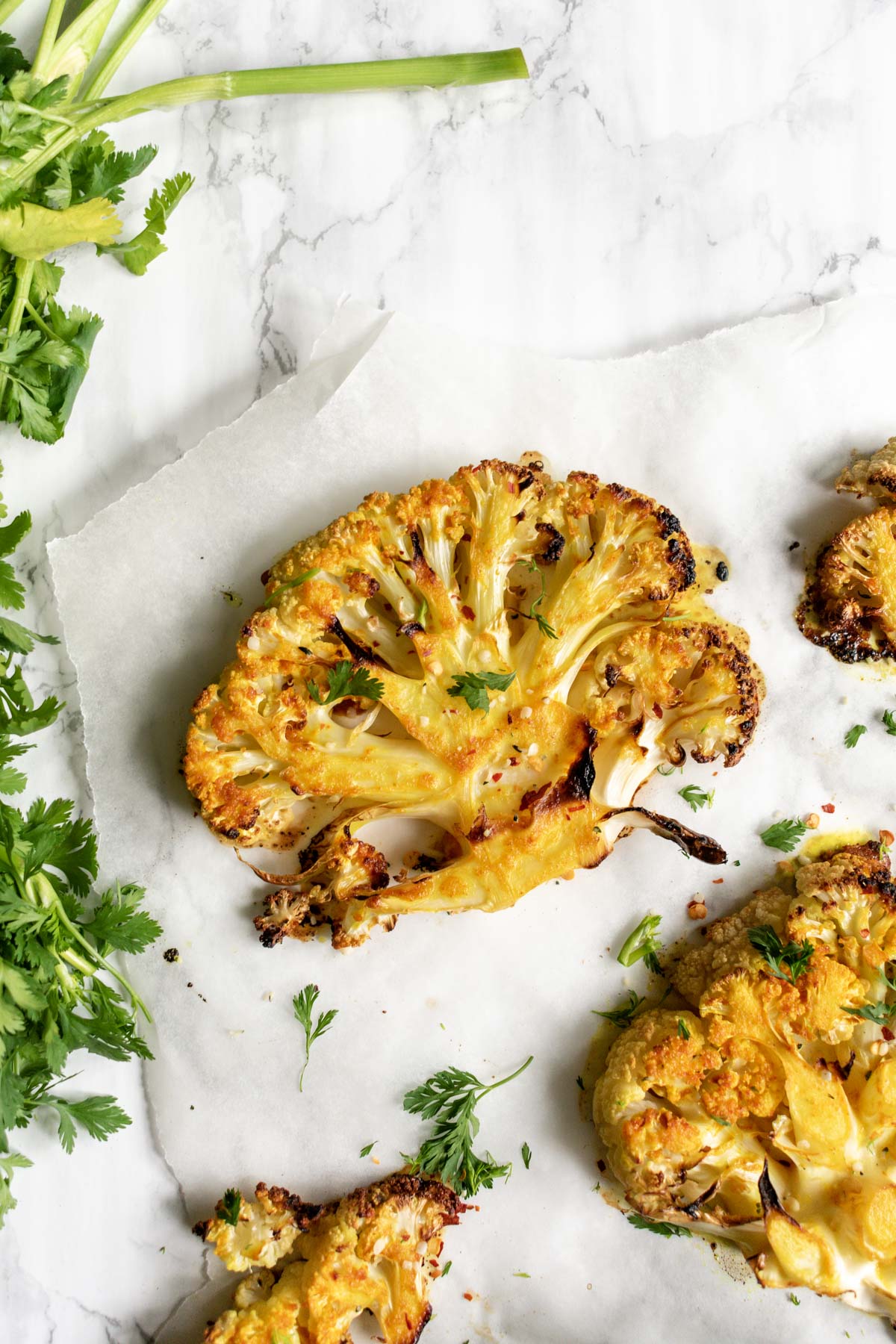 a cauliflower steak roasted with turmeric and spices