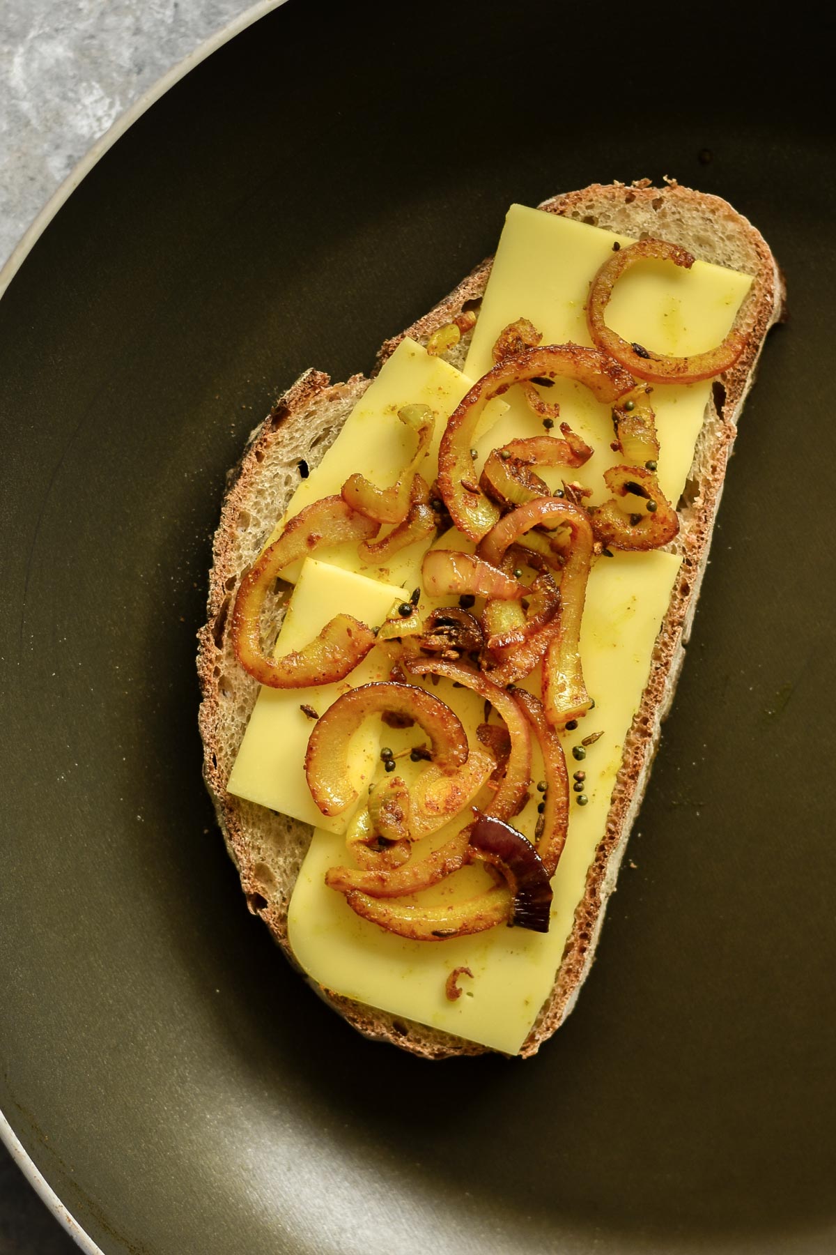 sourdough bread, cheese and spiced onions