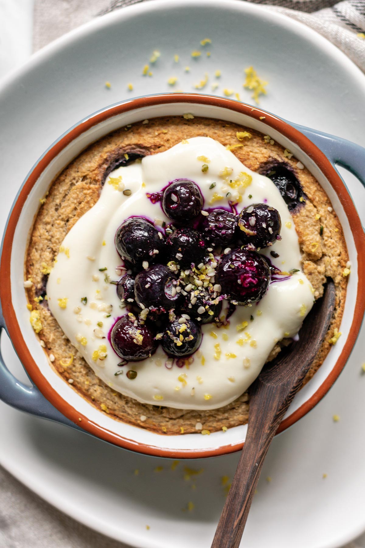 lemon blueberry baked oats with a spoon