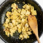 scrambled tofu with turmeric in a pan