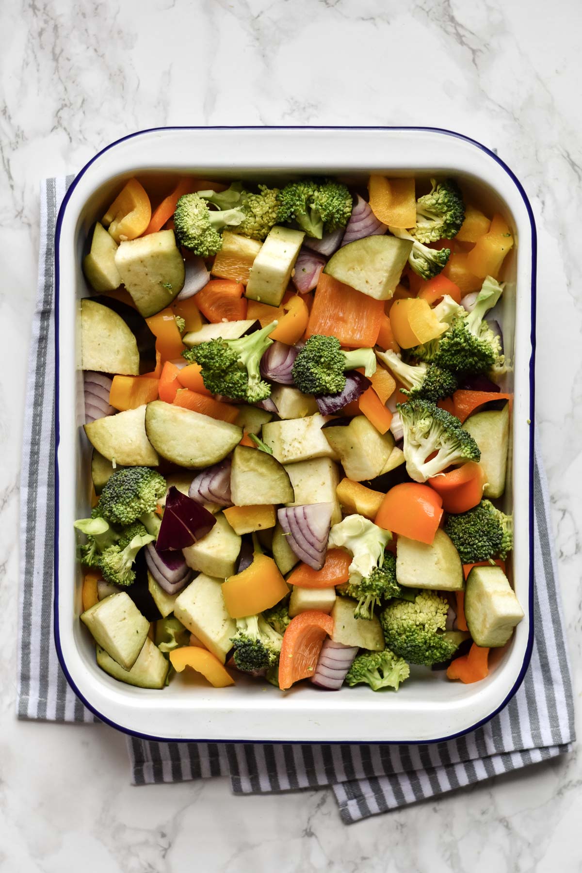 a tray of vegetables ready to be roasted