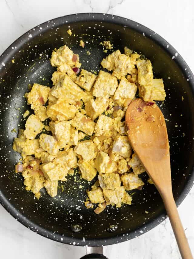 scrambled tofu with turmeric in a pan