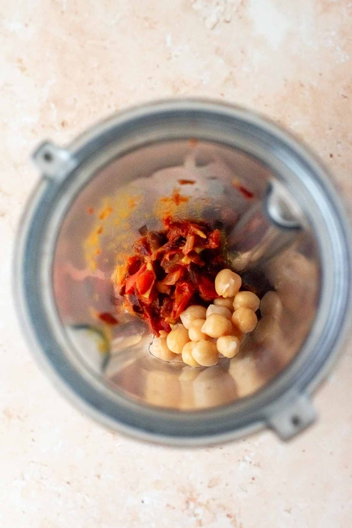 tomato mixture and chickpeas in a blender