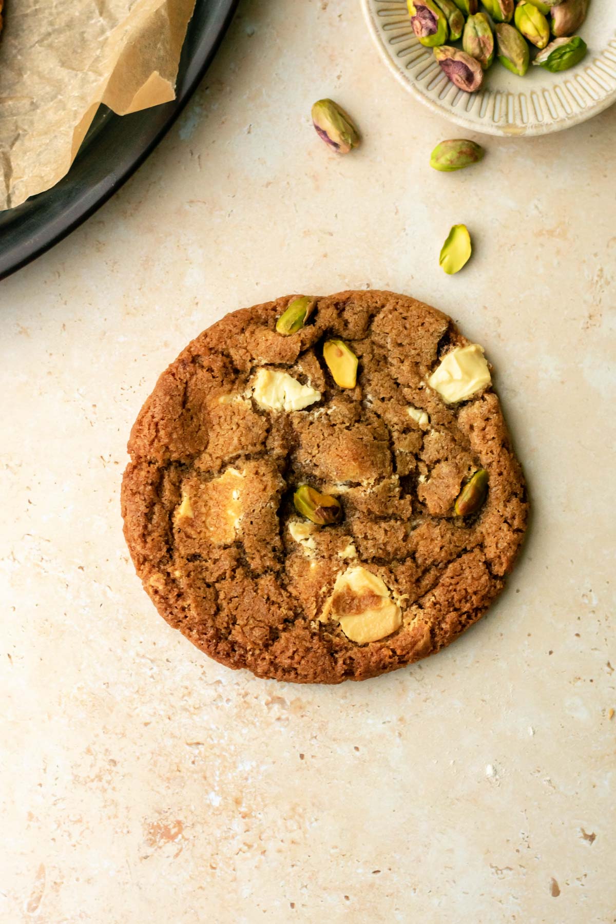 a chewy white chocolate pistachio cookie