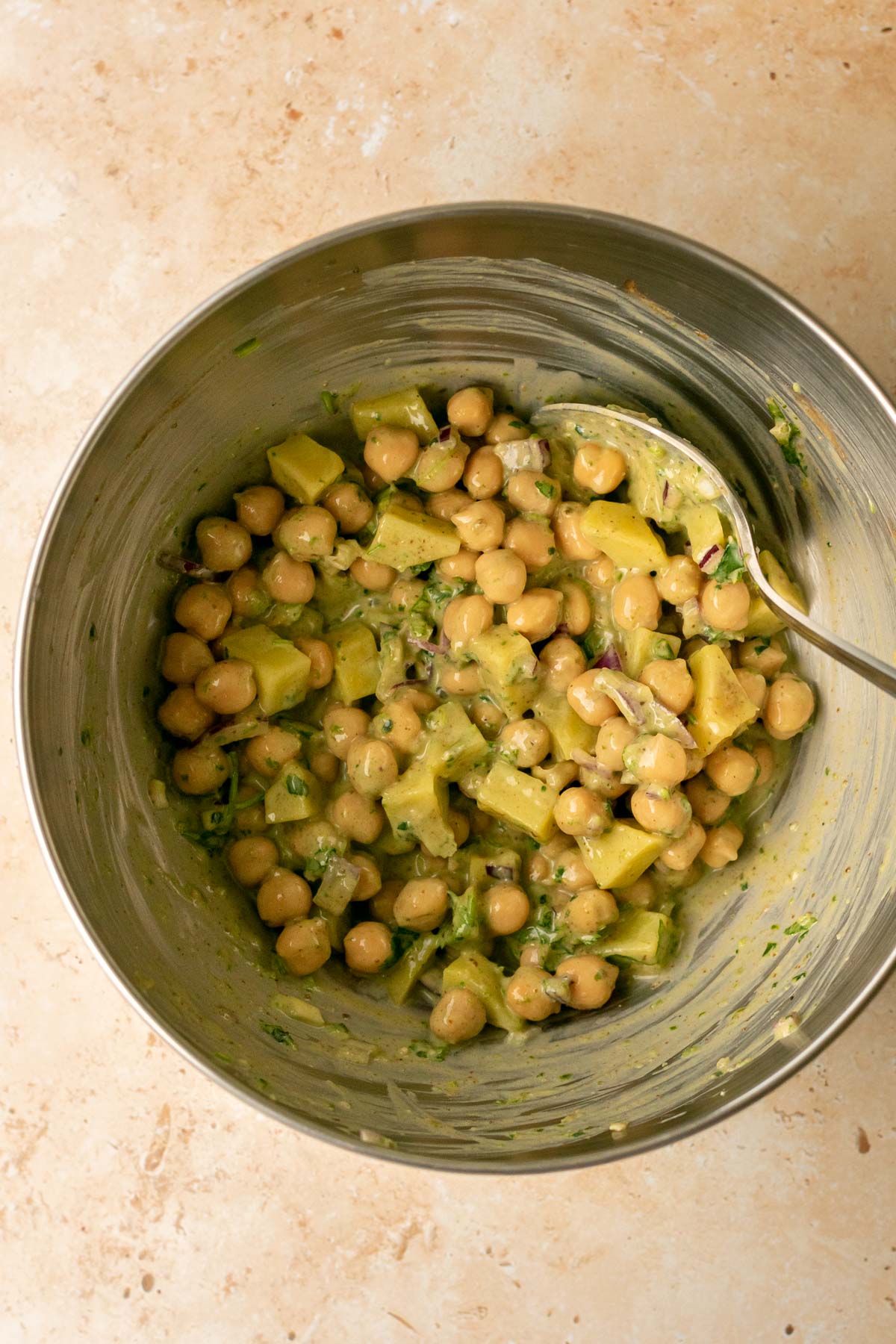 chana chaat ingredients mixed together in a bowl