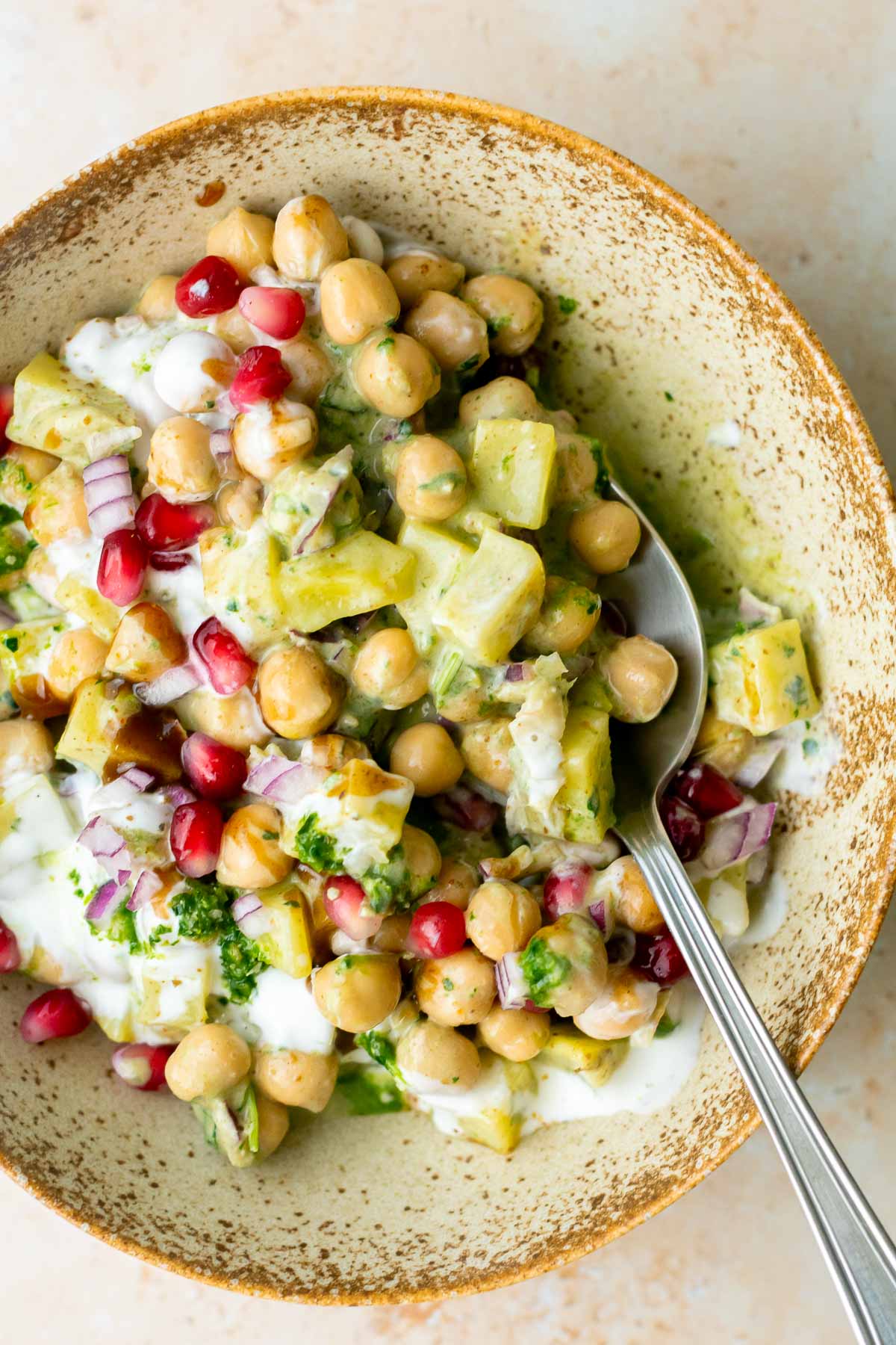 a bowl of chaat being enjoyed