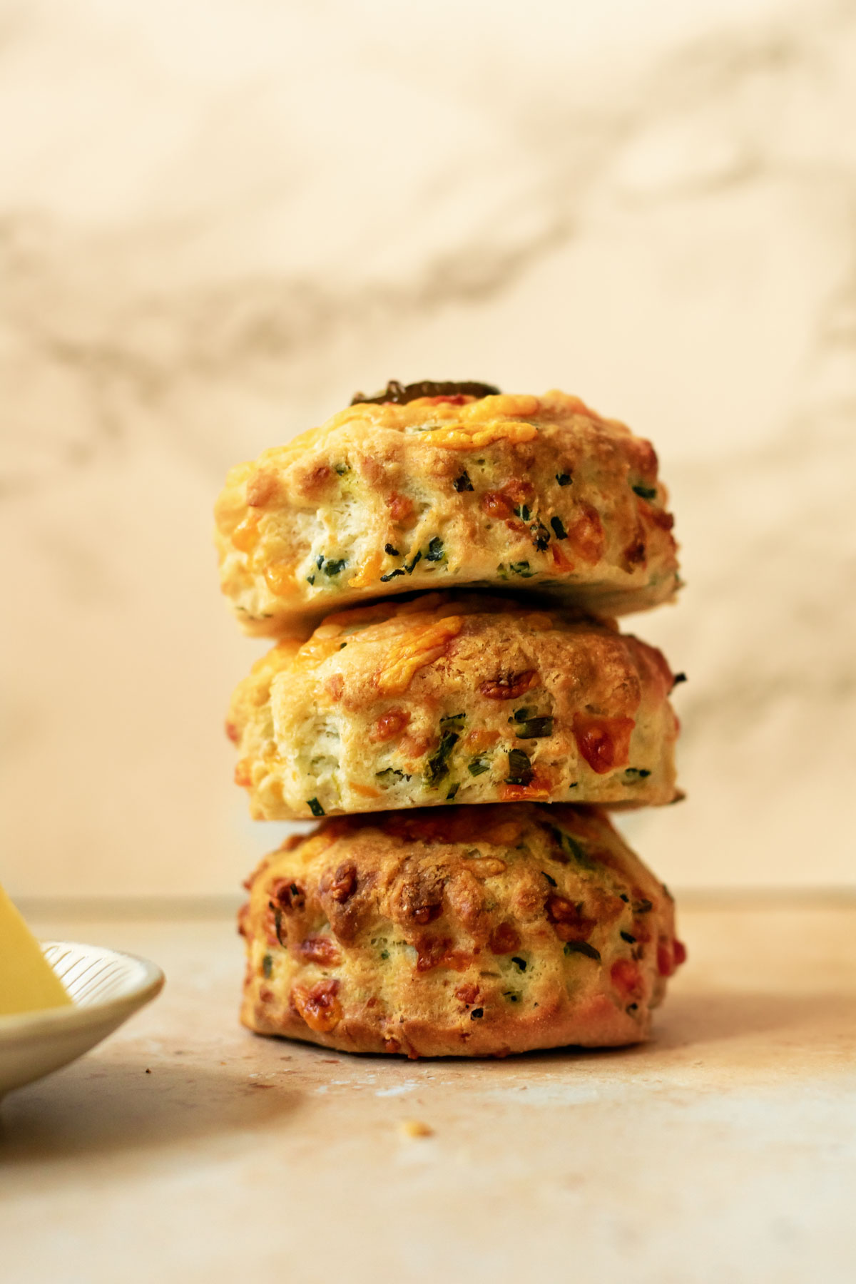three cheese and chive scones stacked up