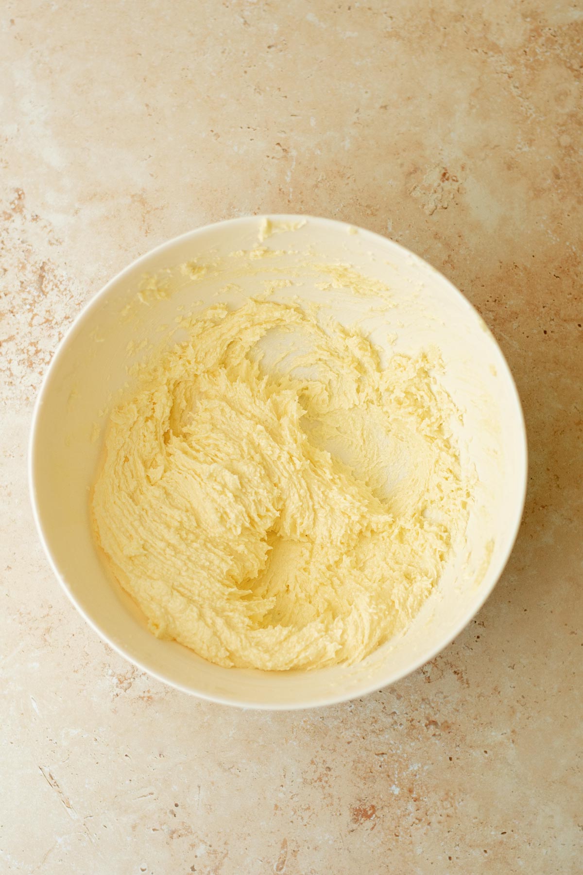 a bowl of creamed butter and sugar