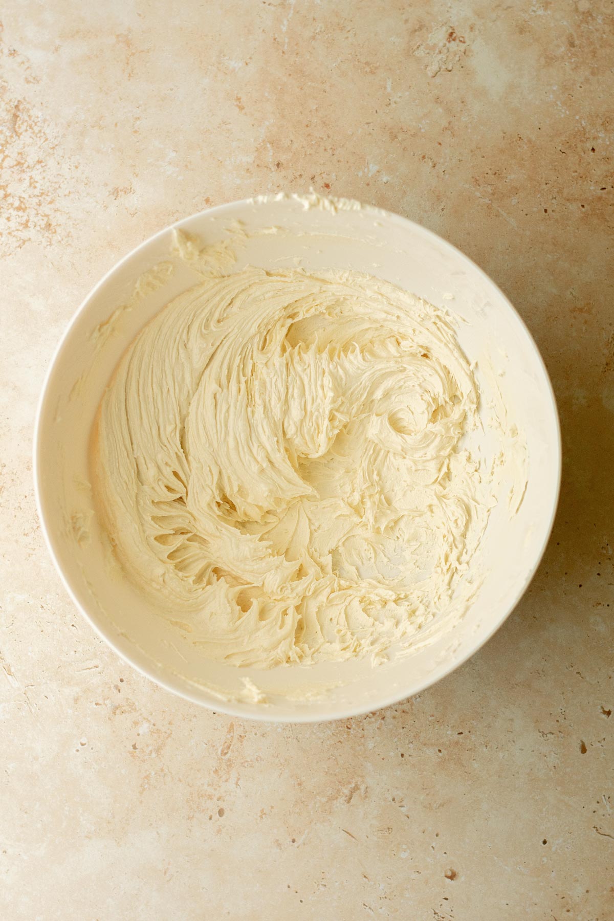 a bowl of freshly prepared buttercream icing