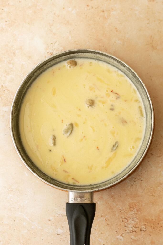 a saucepan containing infused cream