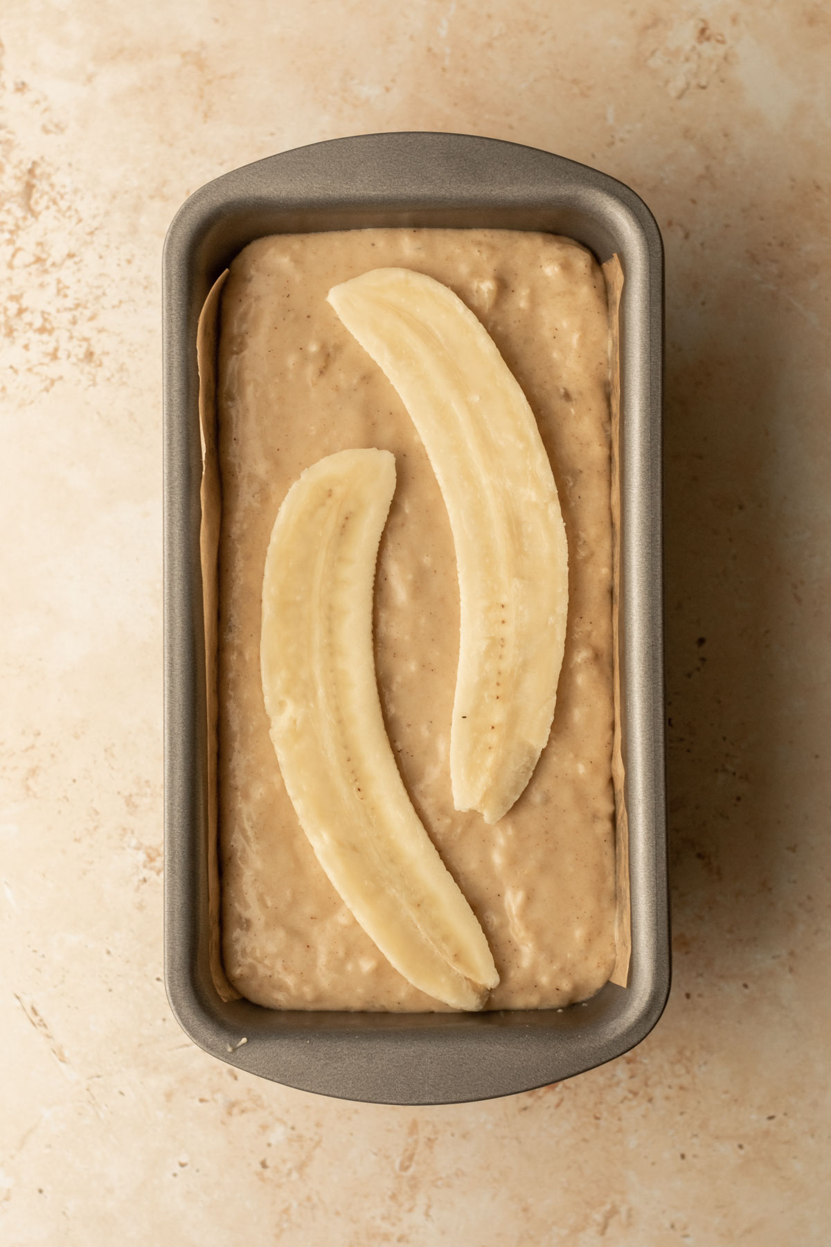 chai banana bread ready to be baked in the oven