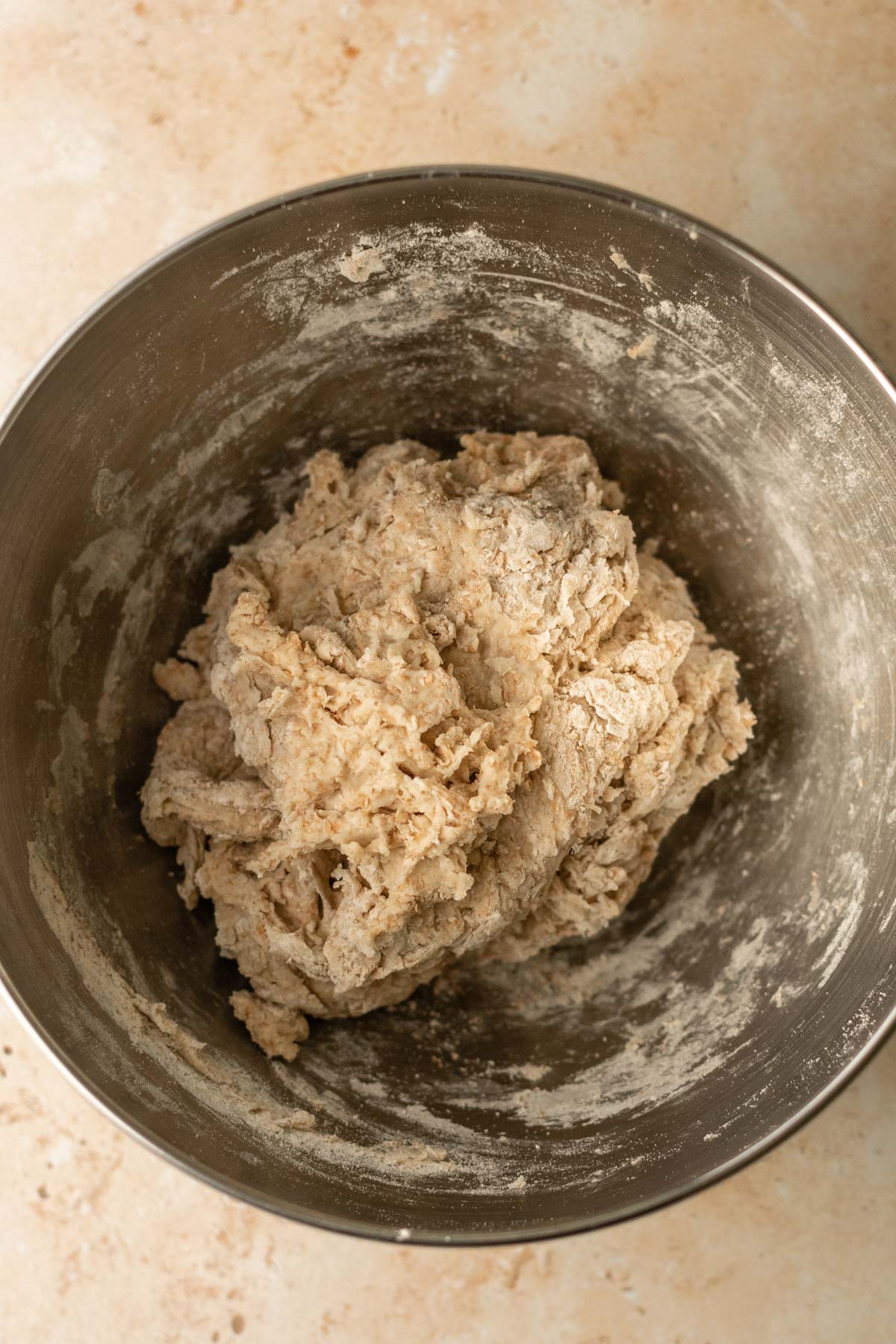 a bowl of scraggly paratha dough