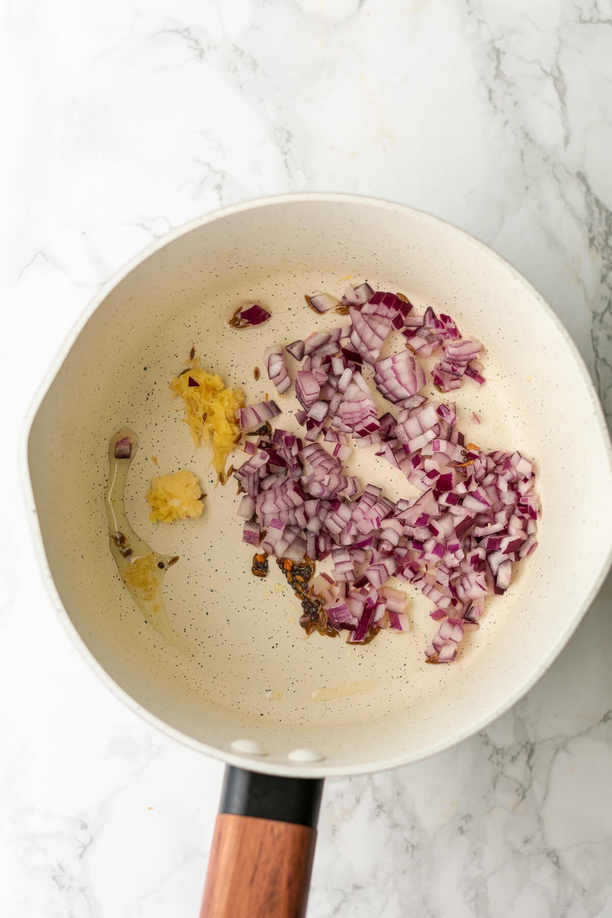 oil, onions, garlic and ginger in a frying pan