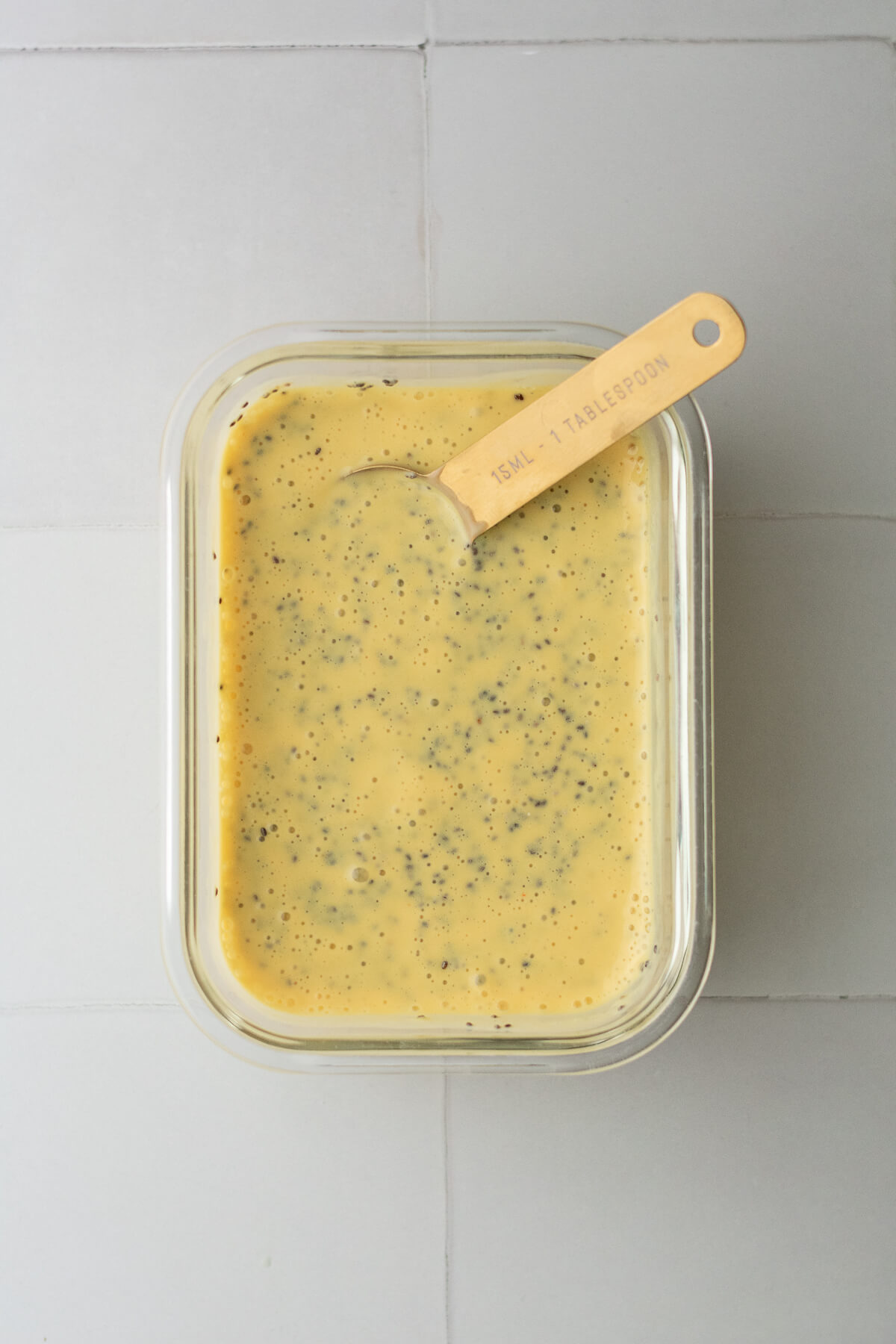 a dish of prepared mango chia pudding ready to be refrigerated